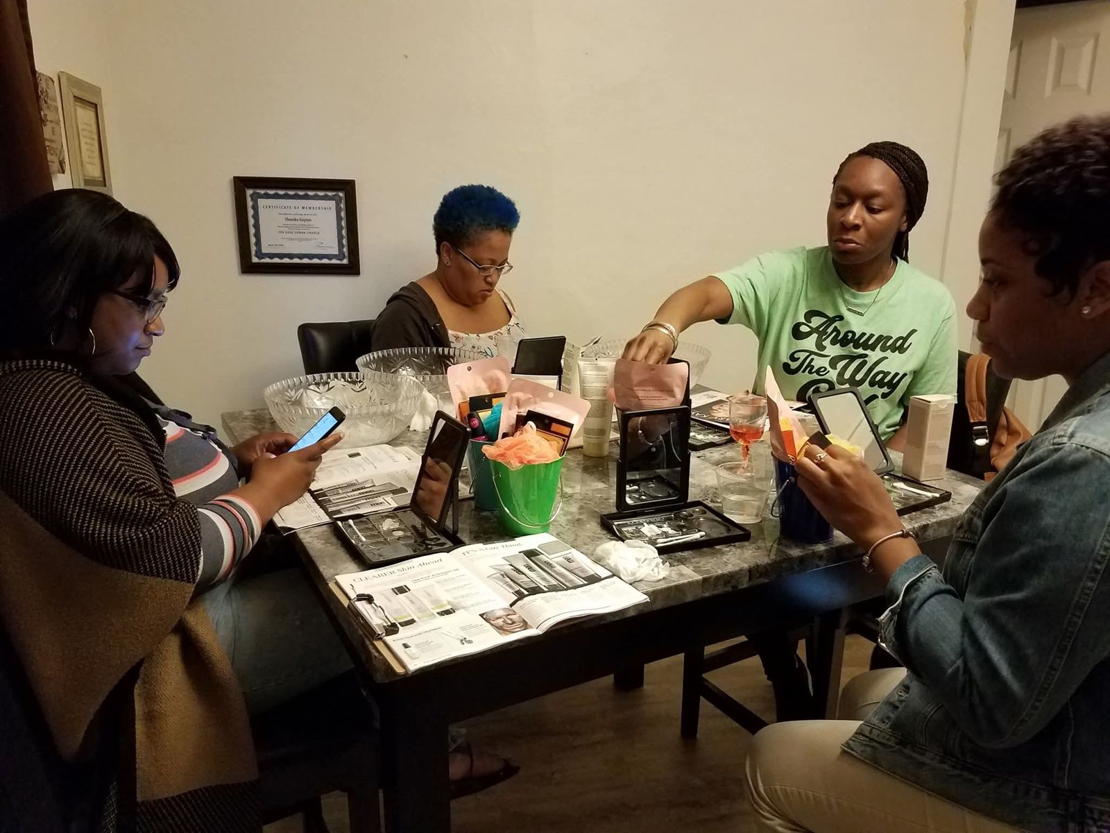 Women gathered around a table at self-care night